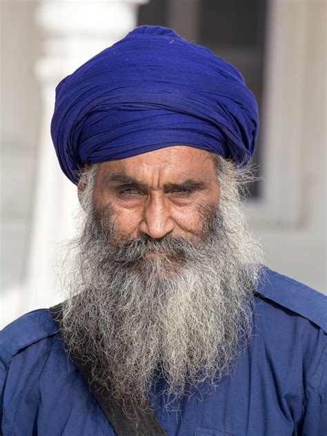 Sikh Man Visiting The Golden Temple In Amritsar Punjab India