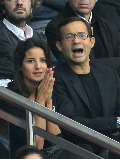 Photo JEAN LUC DELARUE ET SA COMPAGNE ANISSA PEOPLE AU MATCH DE