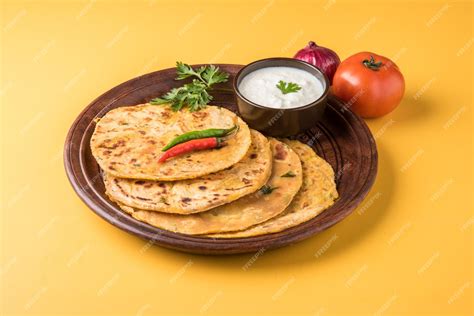 Premium Photo Traditional Indian Food Aloo Paratha Or Potato Stuffed