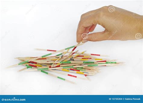 Playing Mikado Game Pick Up Sticks Stock Photo Image Of Moving