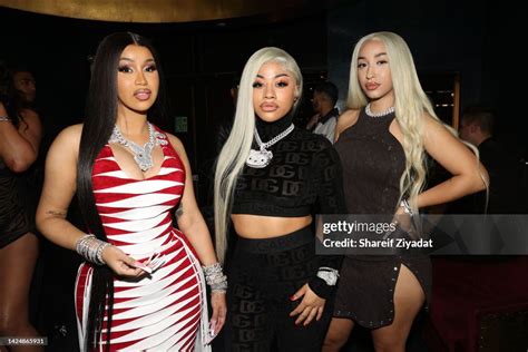 Cardi B And Hennessy Carolina Attend Cardi B Hosts Fashion Night Out