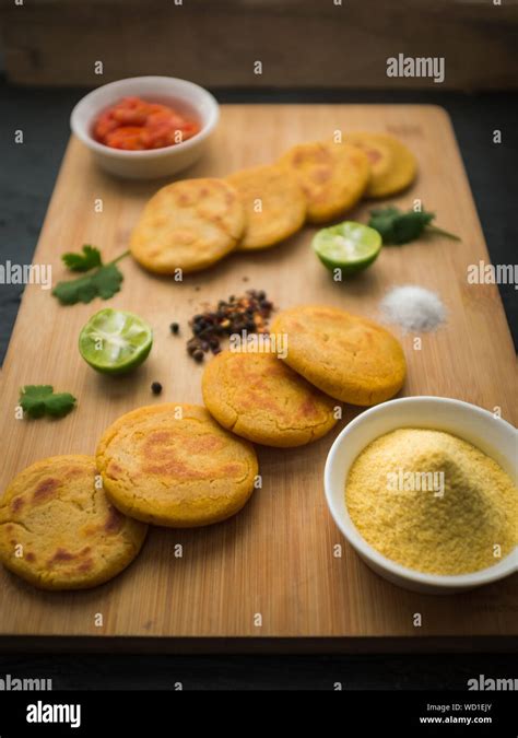 Ingredients and Preparation of Typical Colombian Food: Arepas with two Sauces, Guacamole and ...