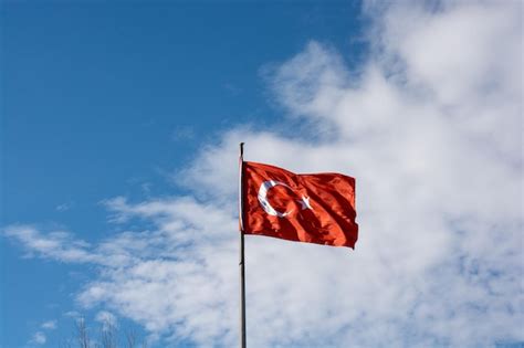 Premium Photo Turkish National Flag With White Star And Moon In Sky