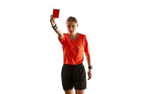 Premium Photo Serious Young Woman Football Referee In Uniform Showing