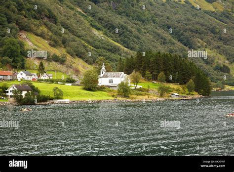 Landscape With Naeroyfjord Mountains And Traditional Village Houses In