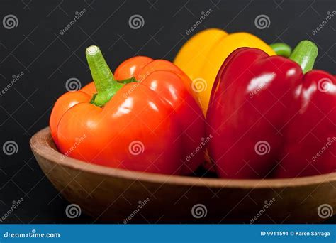 Bell Peppers In Wood Bowl Stock Image Image Of Orange 9911591