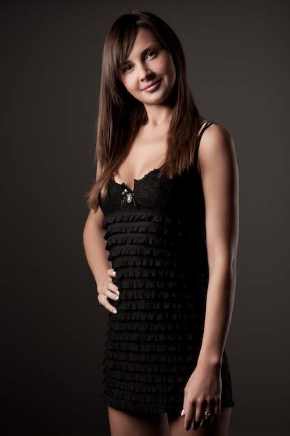 Premium Photo Woman Posing Dressed In Short Black Dress