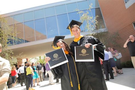 Odu Grads Proudly Showing Off Their Diploma Congrats Grads Welcome To