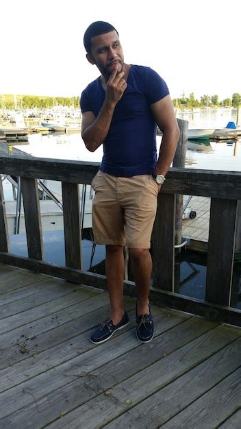 Premium Photo Thoughtful Mature Man Standing On Pier At Harbor