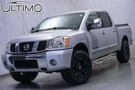 Pre Owned 2005 Nissan Titan Le Pickup Truck In Warrenville Um2160b Ultimo Motors