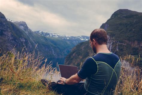 Man Using Laptop Outdoors Royalty-Free Stock Photo