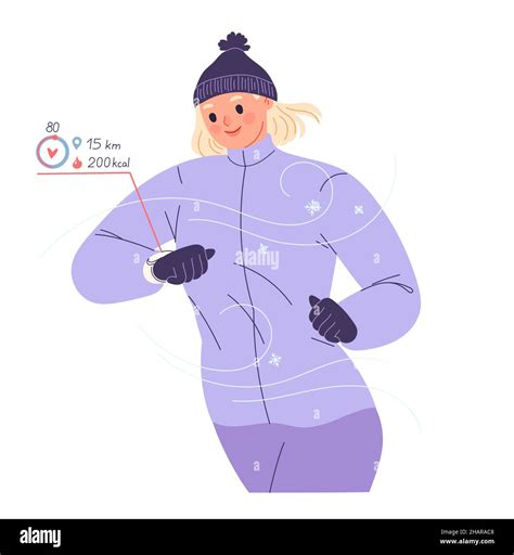 Woman Runs Outside In Winter And Looks At Smart Watch Checking Her