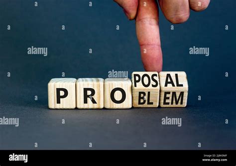 Solving A Problem And Making Proposal Symbol Businessman Turns Wooden