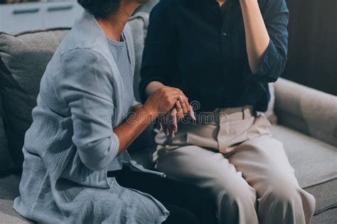 Sad Teen Granddaughter Hugging Depressed Mature Grandmother Giving