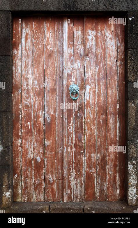 Vintage Wooden Door With Metallic Handle Knocker Stock Photo Alamy