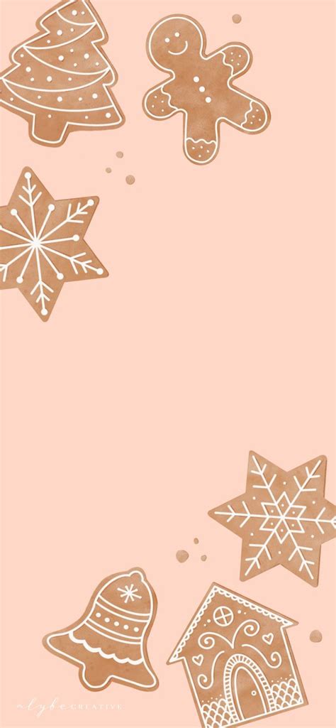 gingerbread cookies are flying in the air with snowflakes and stars ...