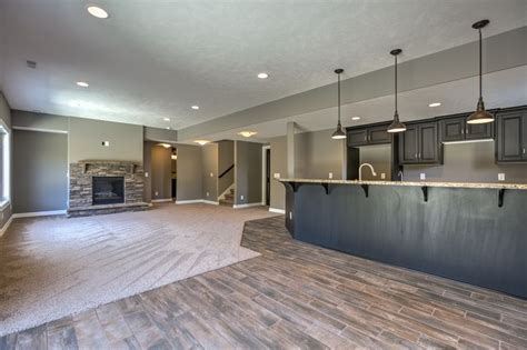 Basement with fireplace and bar | Cool basement ideas, Building a house, Home