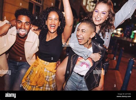 Group Of Friends Laughing And Living Their Best Lives In The City