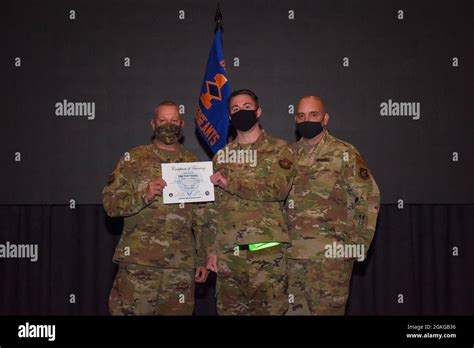 Tech Sgt Tyler Kranz 51st Aircraft Maintenance Squadron Accepts His