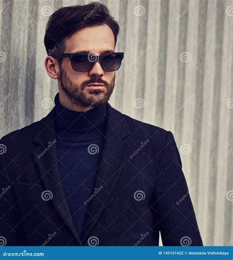 Fashion Beard Style Business Handsome Male Model In Fashion Sunglasses And Blue Coat With