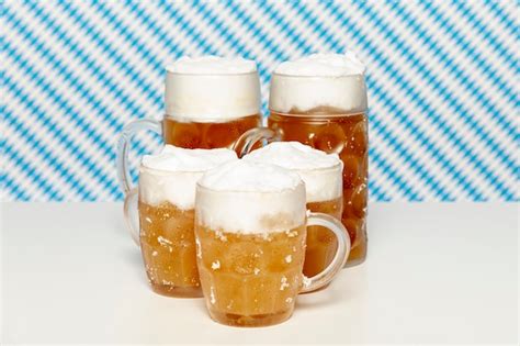 Free Photo Blonde Beer Pints On White Table