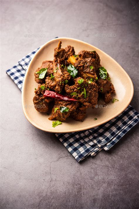 Sukha Mutton Or Chicken Dry Spicy Murgh Or Goat Meat Served In A Plate