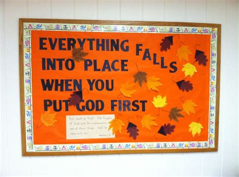 A Bulletin Board With Fall Leaves On It That Says Everything Falls Into