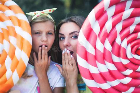 Blonde Mum With Her Daughter Surprised Holds Big Chupa Chups Stock Image Image Of Love Chupa