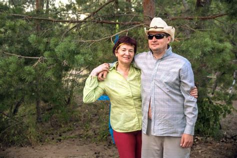 Portrait Of A Mature Woman With An Adult Son In Nature Stock Photo Image Of Face Looking
