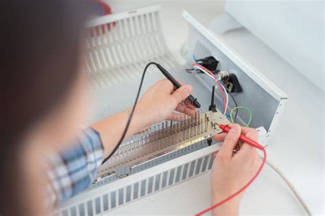 Multimeter Probes Testing Heater Element Stock Photo - Image of power ...