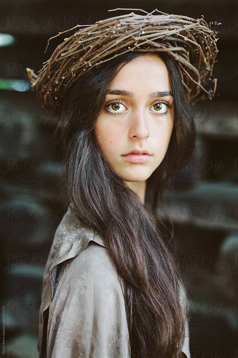 A Portrait Of A Beautiful Brunette With Long Hair By Stocksy