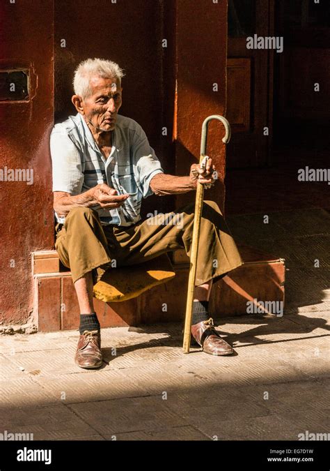 Sitting Beggar High Resolution Stock Photography and Images - Alamy