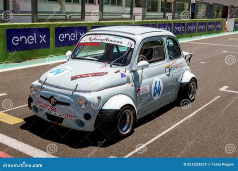 Fiat 500 Old Classic Italian Mini Car Racing On Asphalt Track Standing