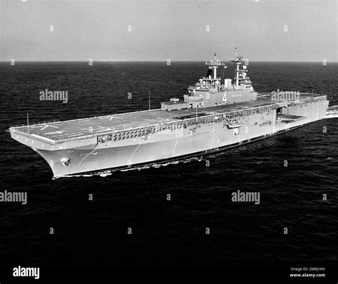 An aerial port bow view (45 degrees off centerline) of the amphibious ...