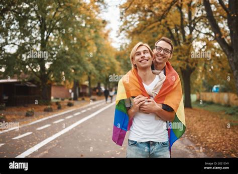Romantic Gay Couple Hugging Kissing And Holding Hands Outdoors Two Handsome Men Holding Lgbt
