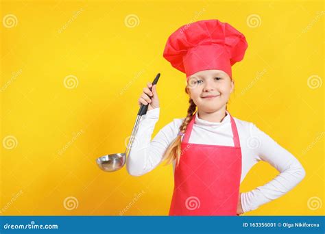 Cheerful Cute Baby Chef Holds Soup Ladle In Hands Little Girl In