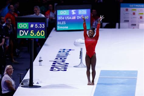 Simone Biles wins vault silver at World Championships after falling on ...