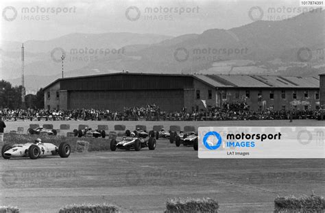 Innes Ireland BRP 2 BRM Leads Phil Hill Cooper T66 Climax And