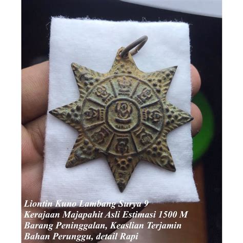 Jual Liontin Kuno Lambang Surya Kerjaan Majapahit M Shopee Indonesia