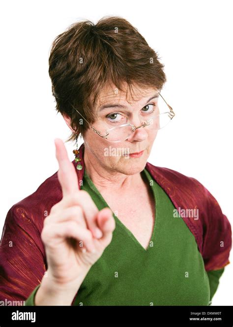 Bossy Looking Middle Aged Woman Wagging Her Finger In Disapproval