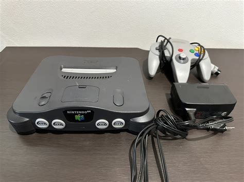 【やや傷や汚れあり】n64 Nintendo64 ニンテンドー64 Nus 001 本体 コントローラー 通電確認済み 動作未確認の落札情報