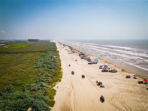 Aerial View Of Cars Parked Along The Beach On The Texas Coast Port