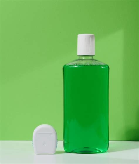 Premium Photo Refreshing Mouthwash In A Transparent Plastic Bottle