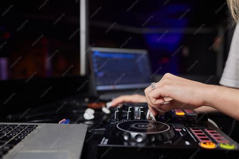 premium photo dj turntable console mixer controlling   hand