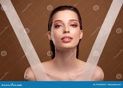 Photo Of Cute Shiny Woman Nude Shoulders Using Anti Wrinkles Tapes