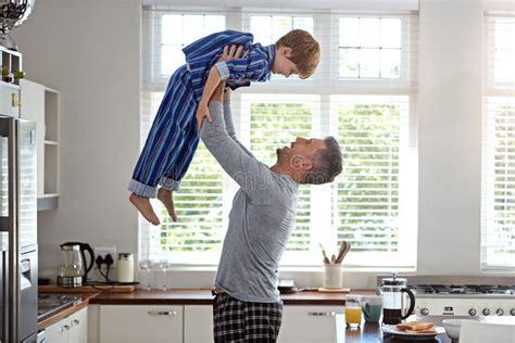 Having The Best Time With His Son A Father And Son Enjoying Some Quality Time At Home Stock