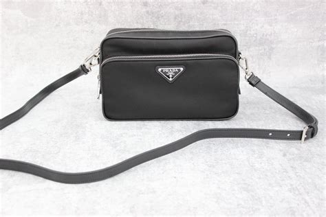 Prada black nylon & leather crossbody camera bag at Jill's Consignment