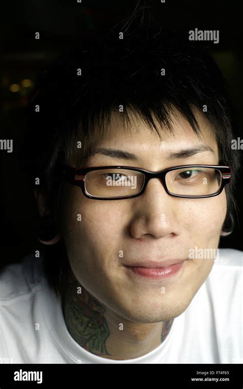 Young Asian Man With Tattoo Stock Photo Alamy