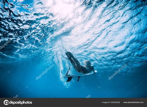 Surfer Girl Surfboard Dive Underwater Ocean Wave Stock Photo By ©keola