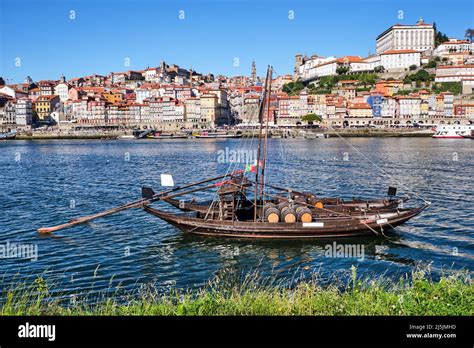 Porto And The Douro River With Two Of The Traditional Rabelo Boats